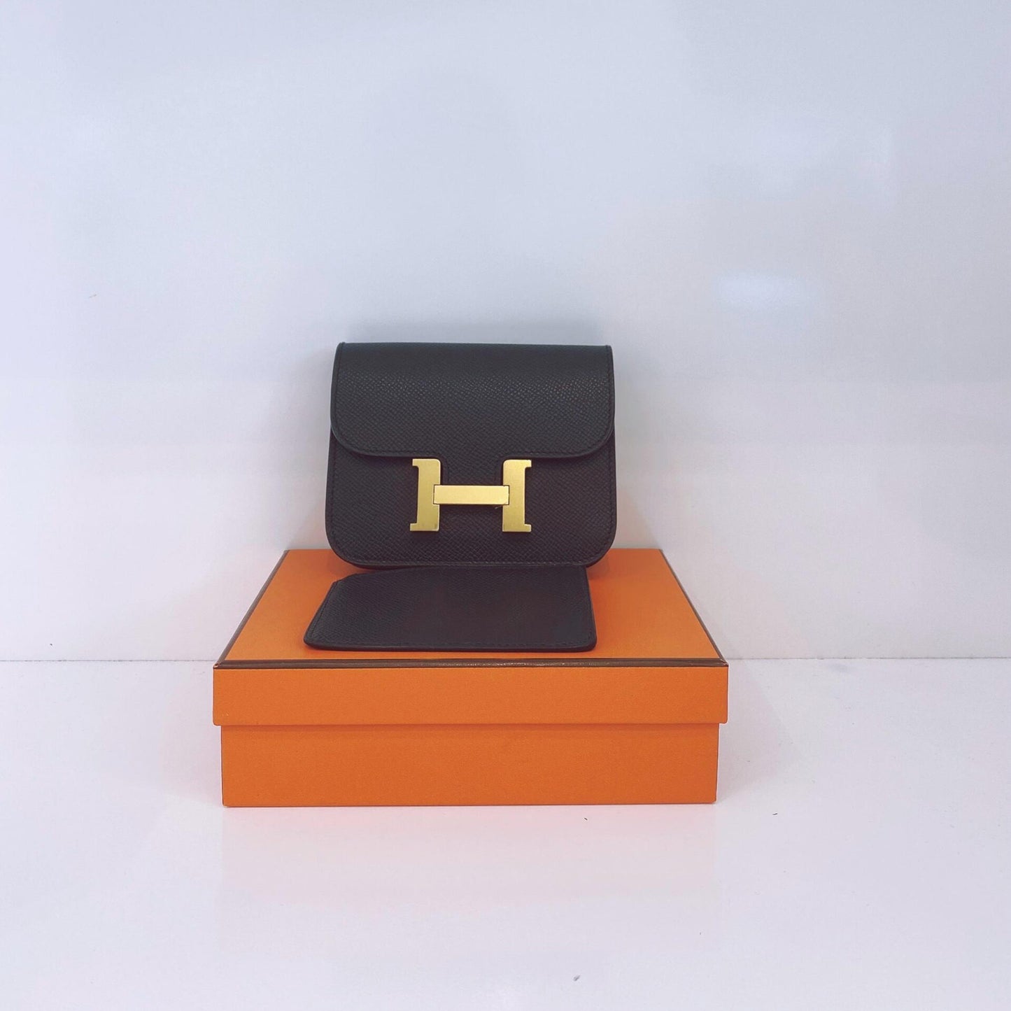 BLACK EPSOM AND CALFSKIN LEATHER CONSTANCE SLIM WALLET