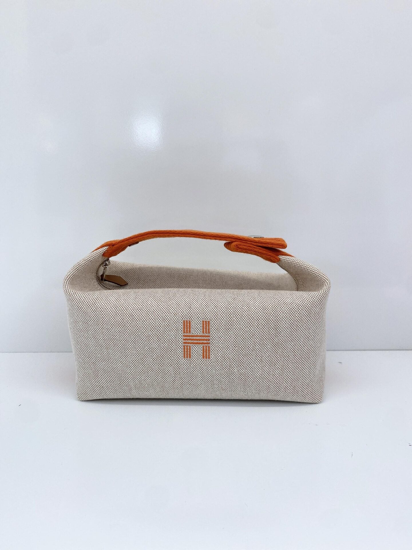 BEIGE ORANGE BRIDE-A-BRAC POUCH, SMALL MODEL