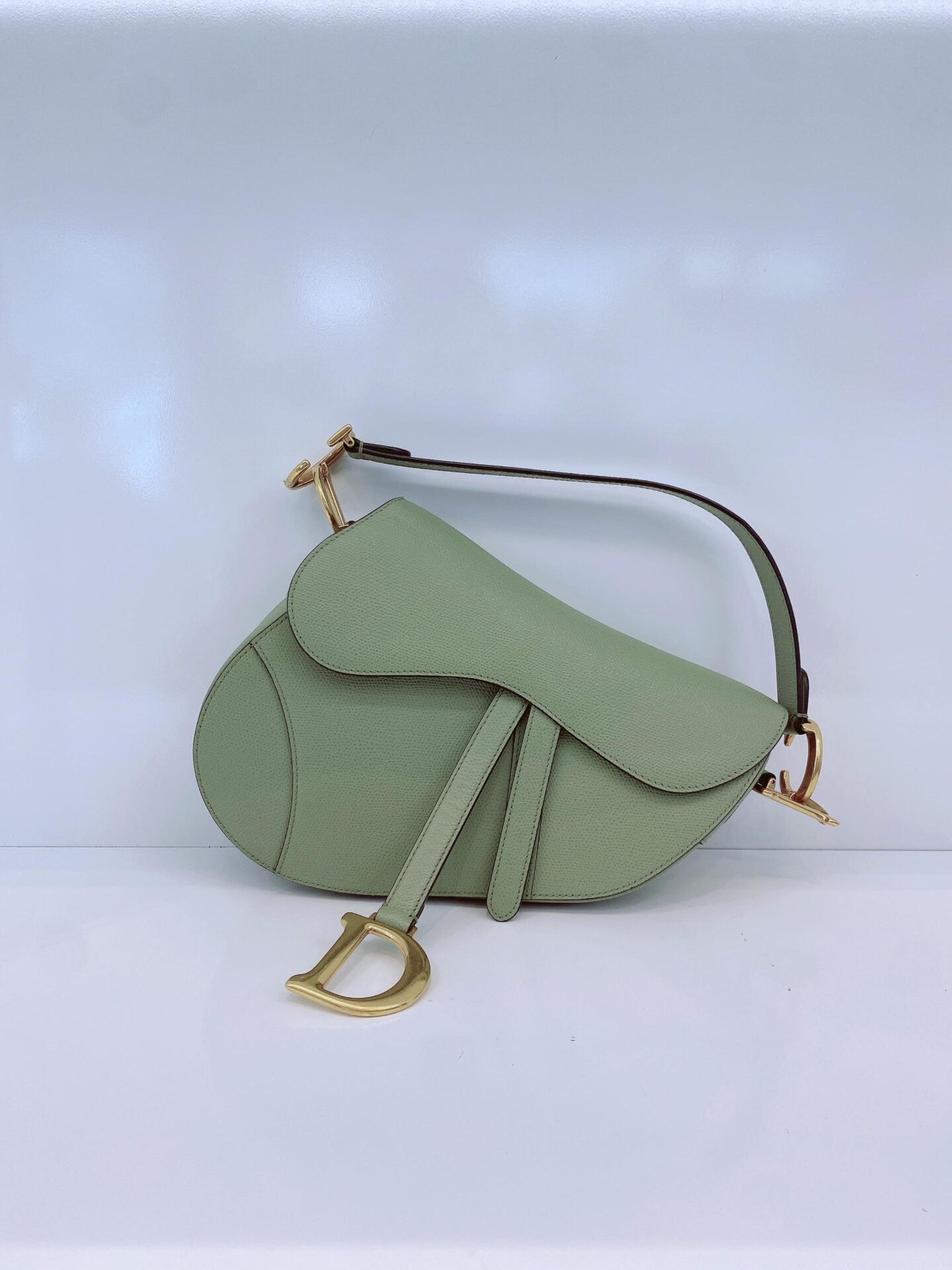 GRAINED LEATHER MEDIUM SADDLE BAG AND ADJUSTABLE EMBROIDERED SHOULDER STRAP