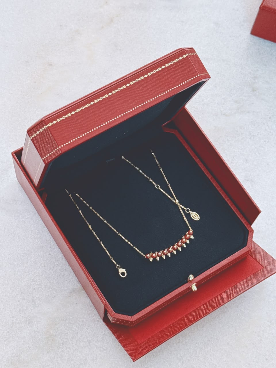 18K ROSE GOLD CLASH DE CARTIER PENDANT, AGATE