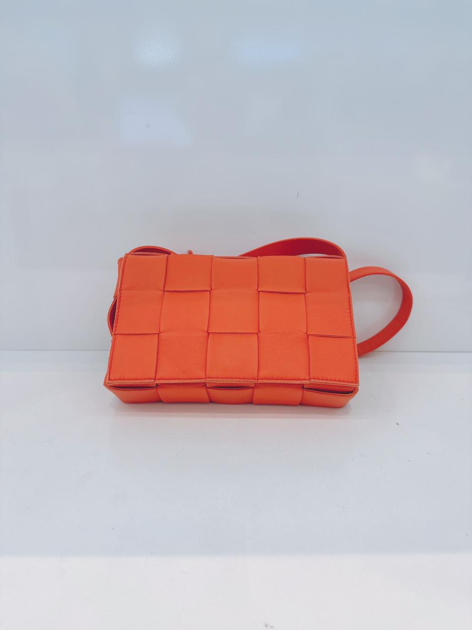 ORANGE LAMBSKIN INTRECCIATO CASSETTE CROSSBODY BAG