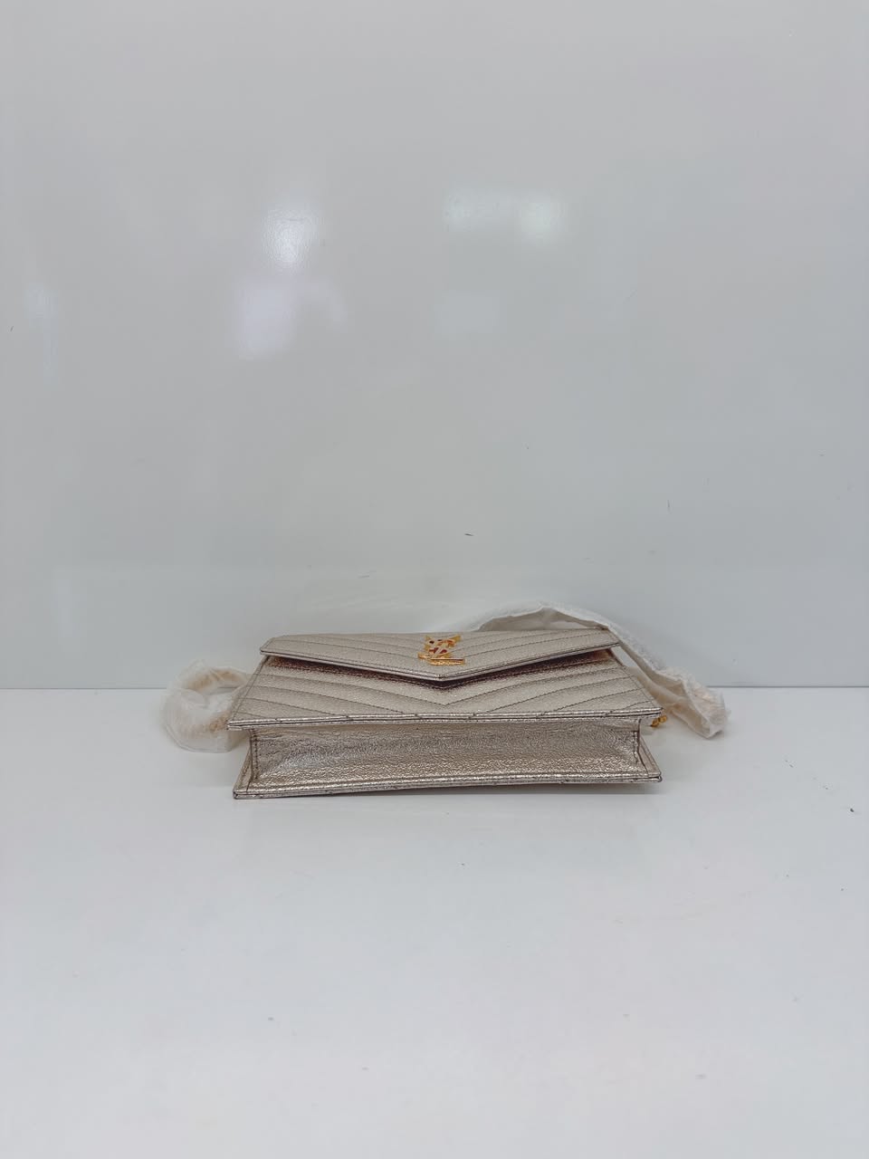 GOLD TEXTURED MONOGRAM SMALL CASSANDRE ENVELOPE WALLET ON CHAIN