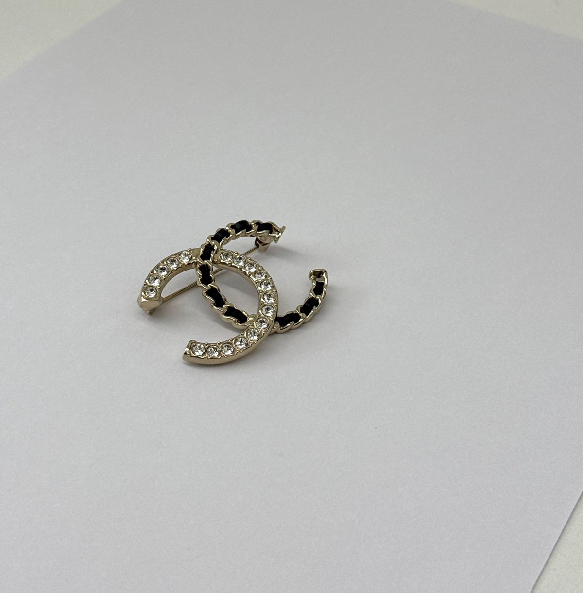 CC LOGO CRYSTAL AND LEATHER CHAIN GOLD TONE BROOCH
