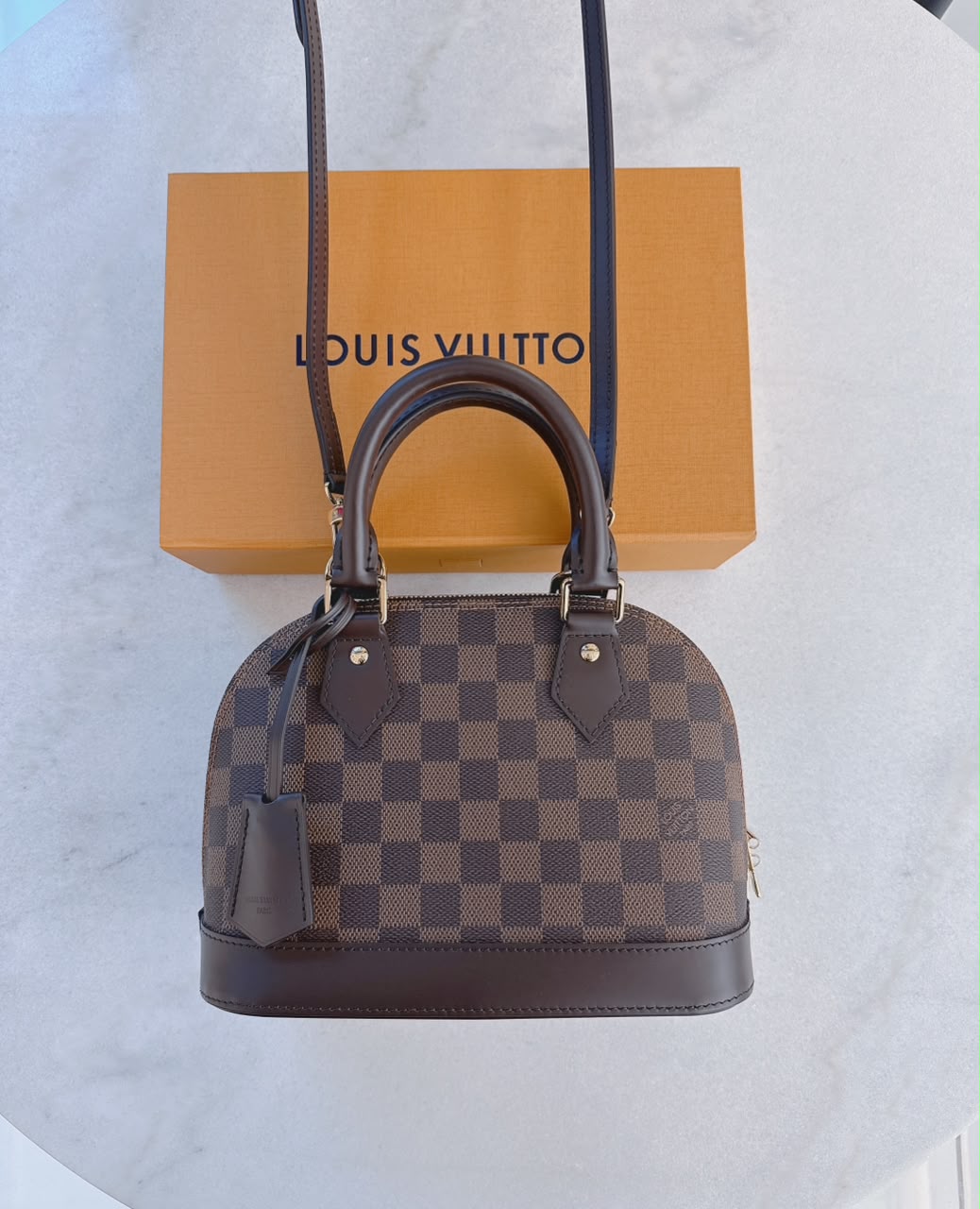 DAMIER EBENE COATED CANVAS ALMA BB HANDBAG
