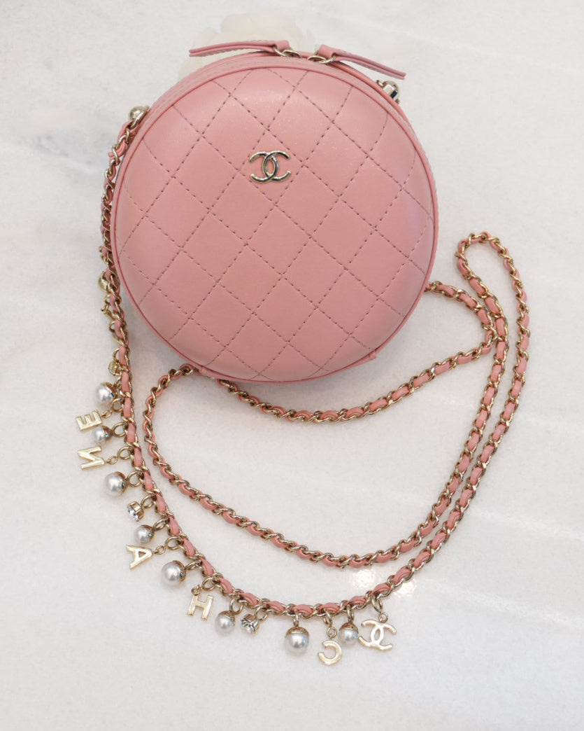 CC QUILTED LAMBSKIN ROUND CROSSBODY BAG
