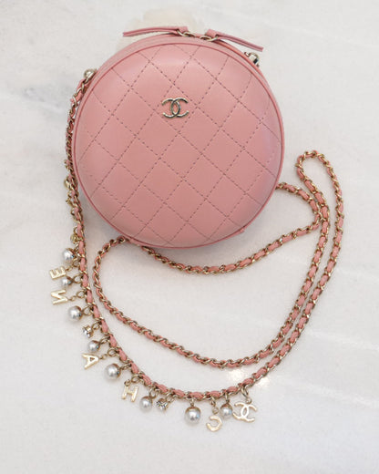 CC QUILTED LAMBSKIN ROUND CROSSBODY BAG