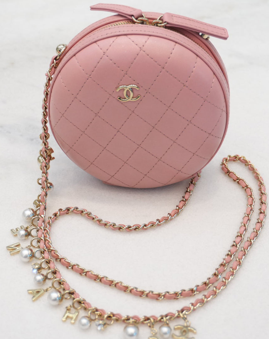 CC QUILTED LAMBSKIN ROUND CROSSBODY BAG