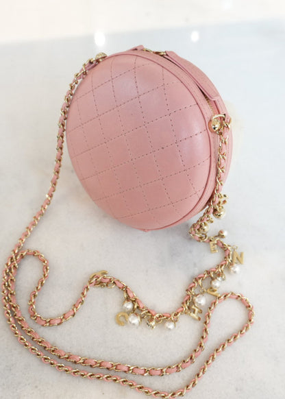 CC QUILTED LAMBSKIN ROUND CROSSBODY BAG