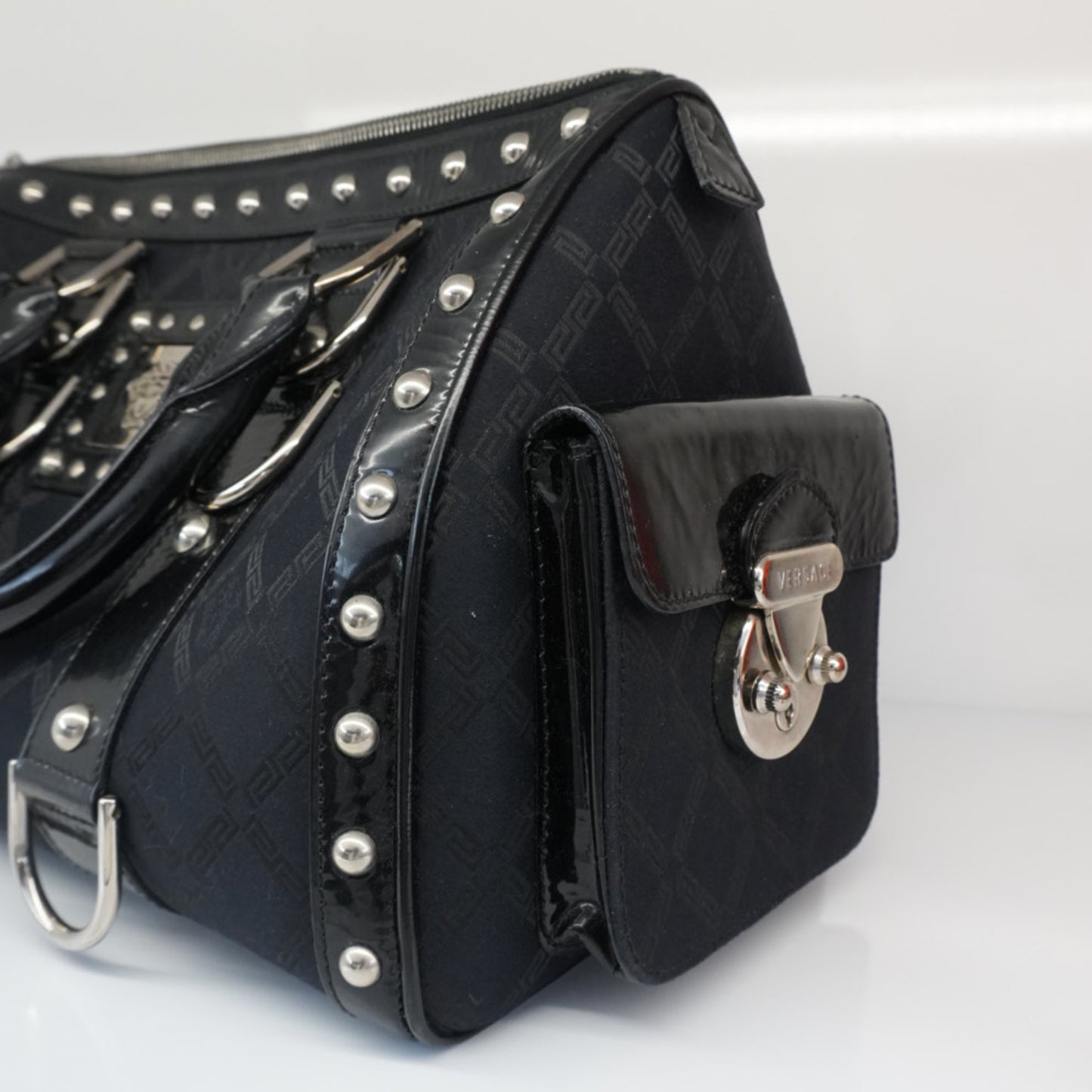 MEDUSA BLACK MONOGRAM FABRIC AND PATENT LEATHER STUDDED TOP HANDLE BOSTON BAG