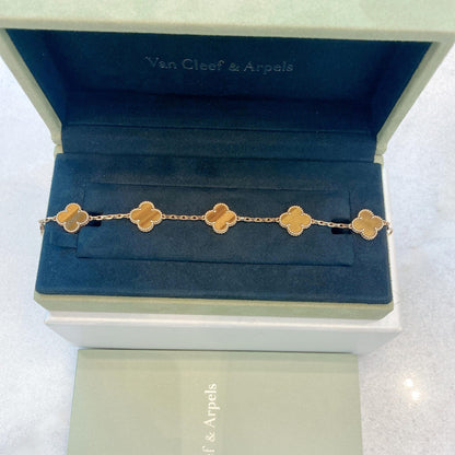 VINTAGE ALHAMBRA TIGERS EYE 18K YELLOW GOLD 5 MOTIF STATION BRACELET