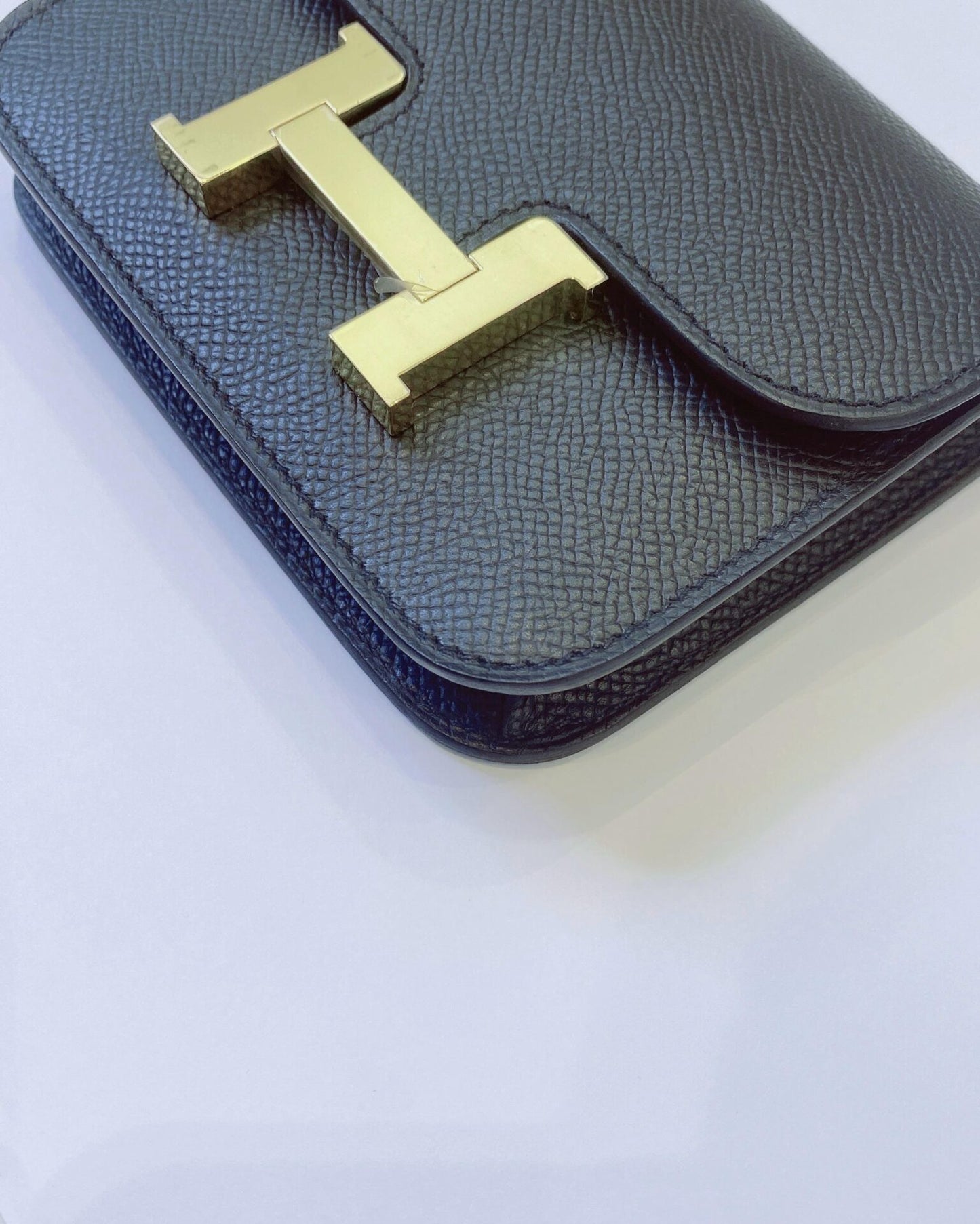BLACK EPSOM AND CALFSKIN LEATHER CONSTANCE SLIM WALLET