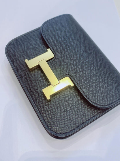 BLACK EPSOM AND CALFSKIN LEATHER CONSTANCE SLIM WALLET