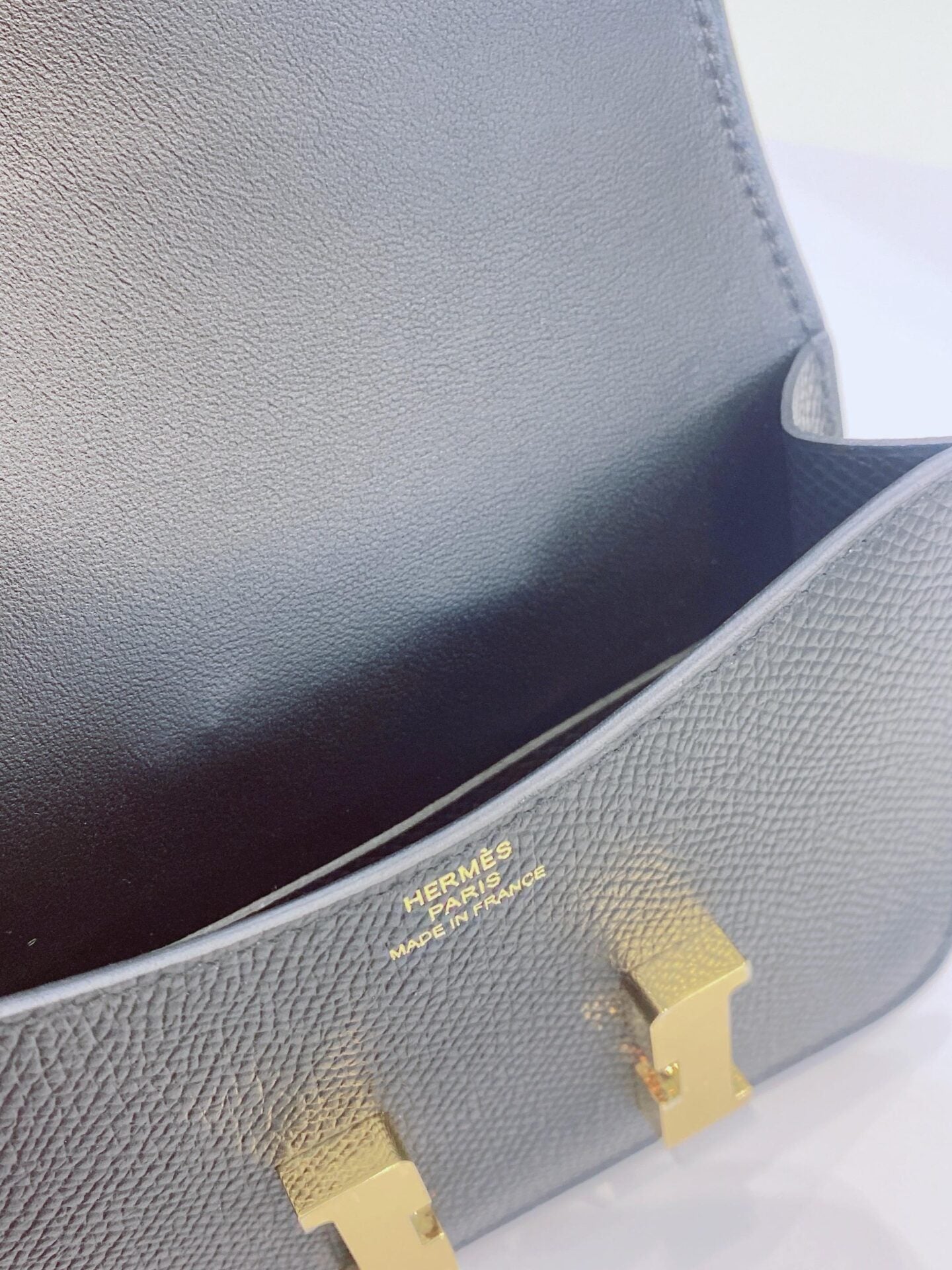 BLACK EPSOM AND CALFSKIN LEATHER CONSTANCE SLIM WALLET