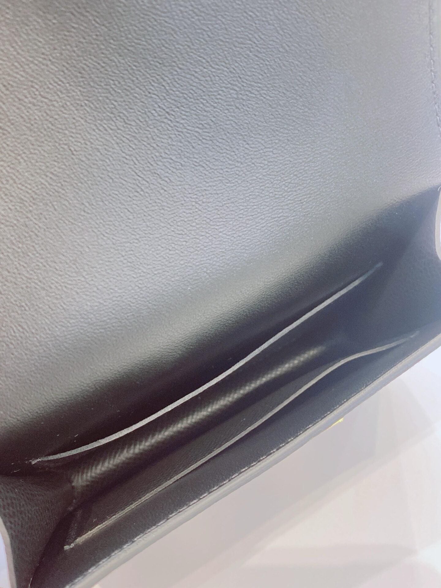 BLACK EPSOM AND CALFSKIN LEATHER CONSTANCE SLIM WALLET