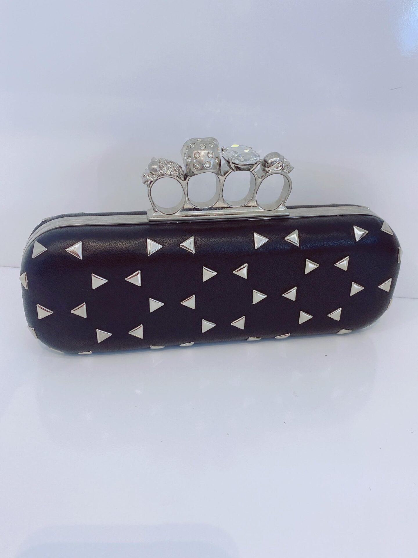 BLACK NAPPA TRIANGLE STUDDED KNUCKLE CLUTCH