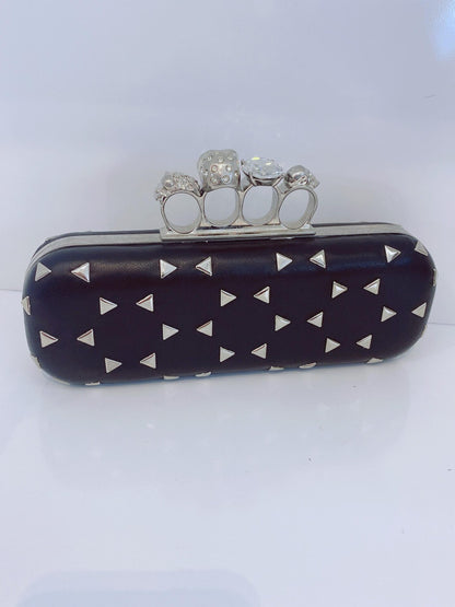 BLACK NAPPA TRIANGLE STUDDED KNUCKLE CLUTCH