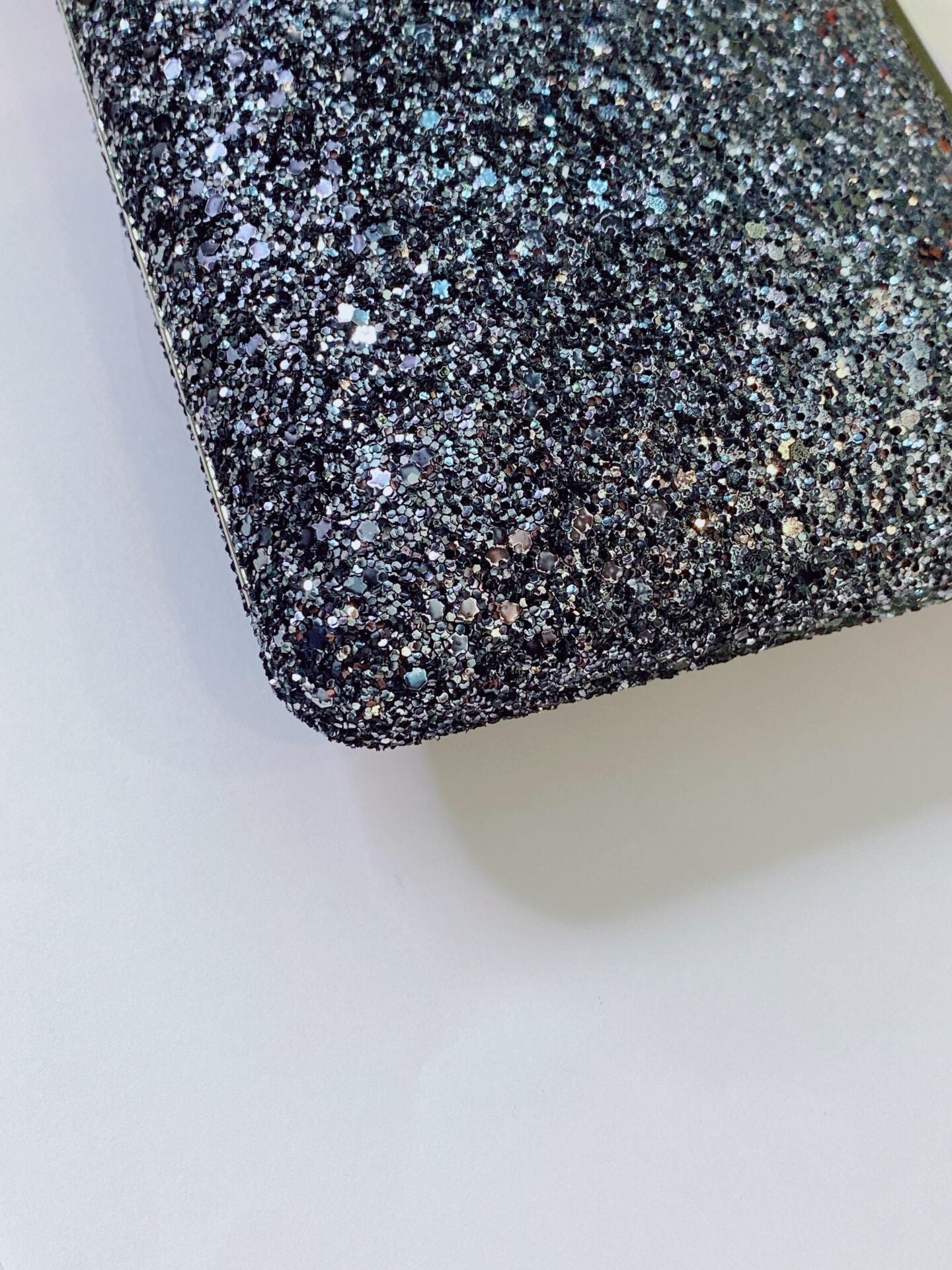 COARSE GLITTER ELLIPSE CHAIN CLUTCH