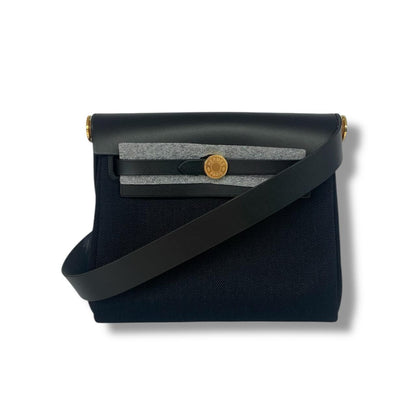 HERBAG ZIP 20 MINI BLACK TOILE MILITAIRE CANVAS AND BLACK VACHE HUNTER GOLD HARDWARE