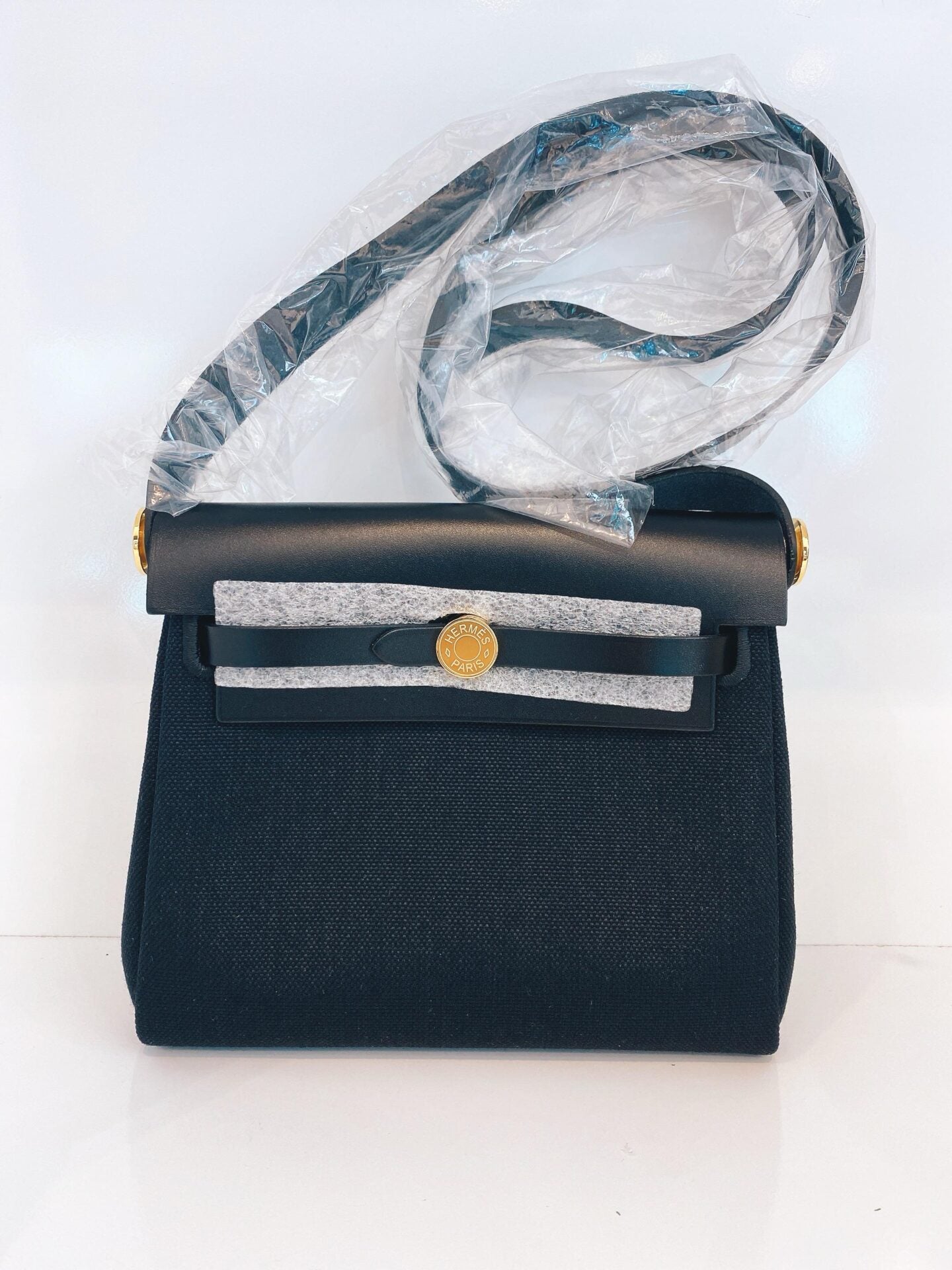 HERBAG ZIP 20 MINI BLACK TOILE MILITAIRE CANVAS AND BLACK VACHE HUNTER GOLD HARDWARE