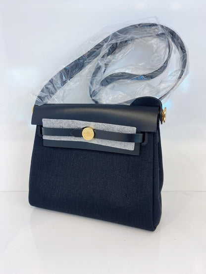 HERBAG ZIP 20 MINI BLACK TOILE MILITAIRE CANVAS AND BLACK VACHE HUNTER GOLD HARDWARE