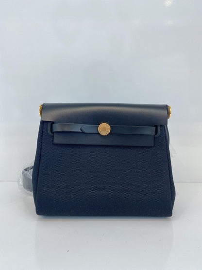 HERBAG ZIP 20 MINI BLACK TOILE MILITAIRE CANVAS AND BLACK VACHE HUNTER GOLD HARDWARE