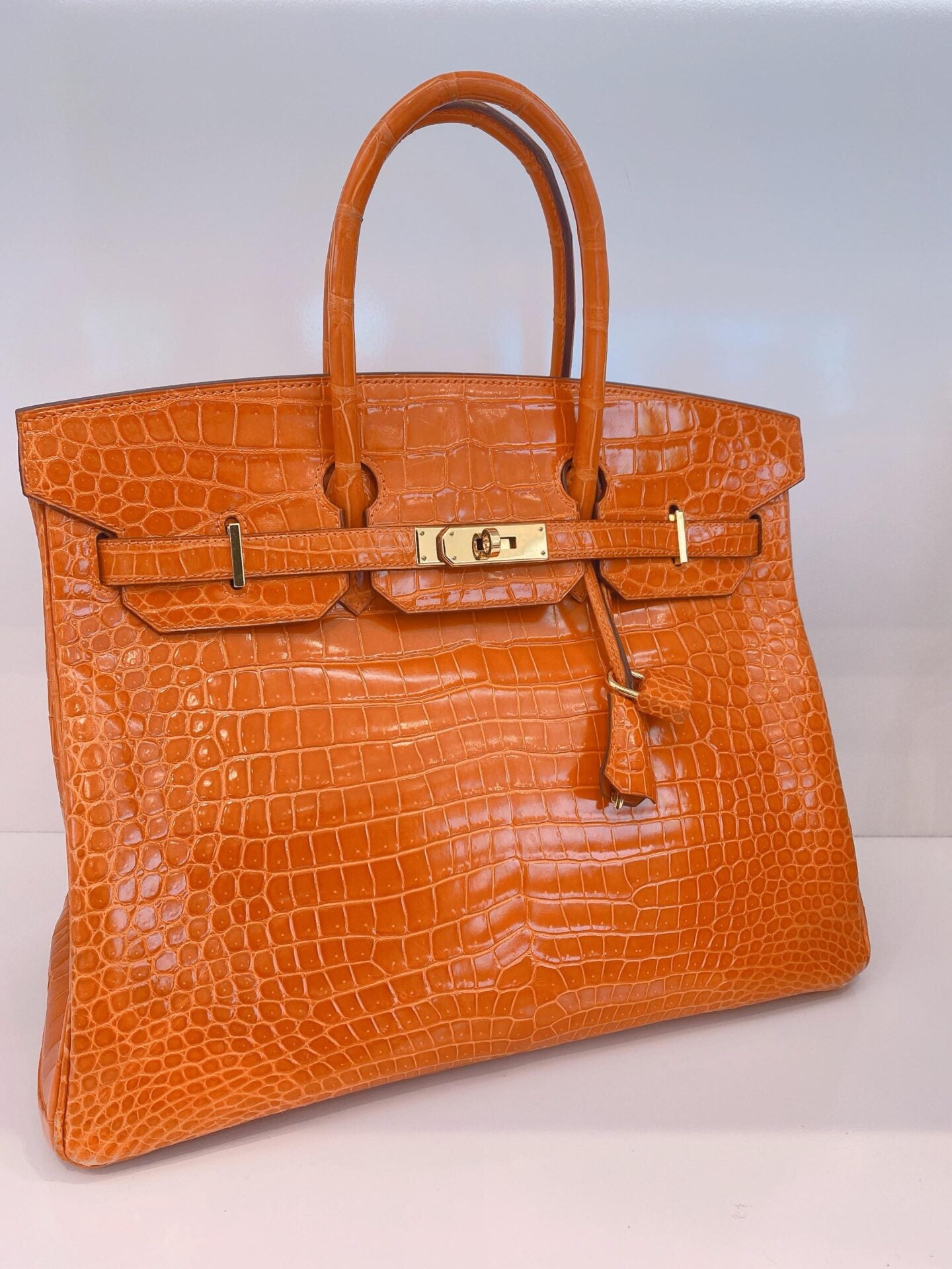 FEU ORANGE SHINY POROSUS CROCODILE BIRKIN 35 GOLD HARDWARE