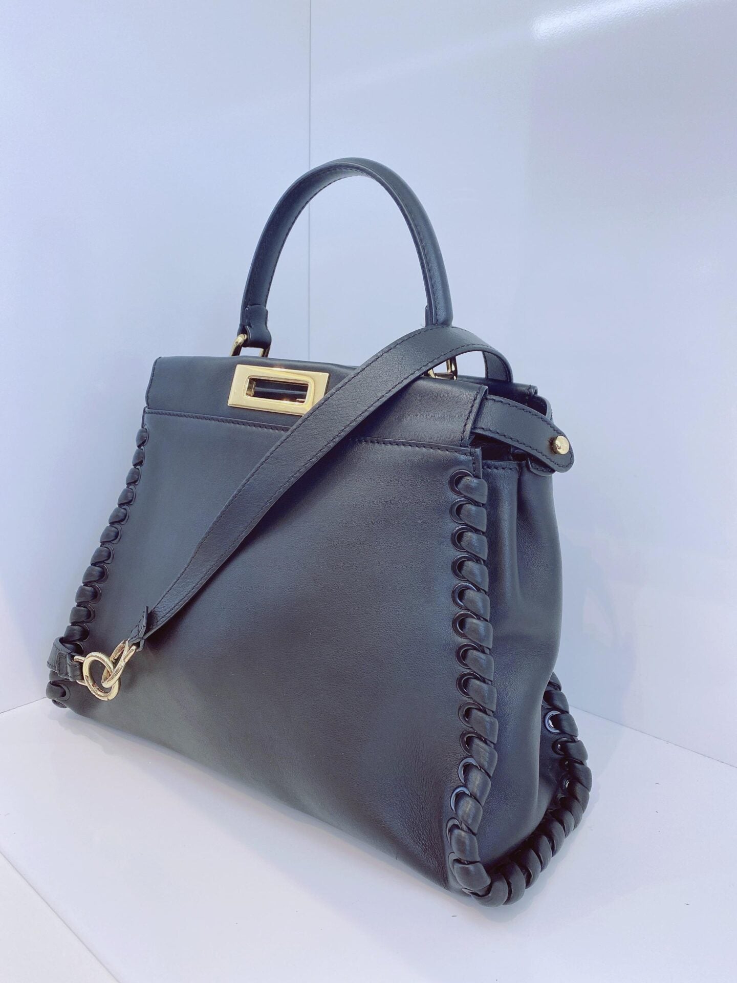 BLACK LEATHER MEDIUM WHIPSTITCHED PEEKABOO TOP HANDLE BAG