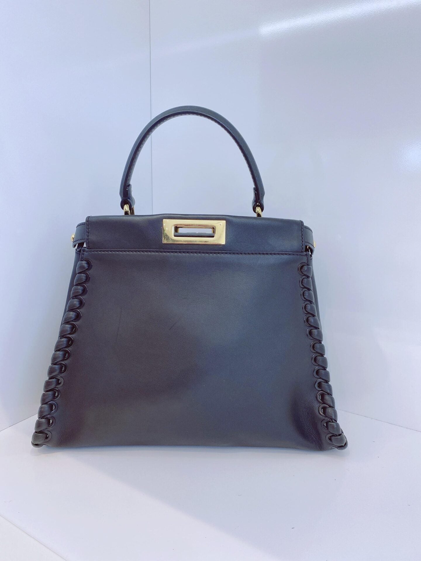 BLACK LEATHER MEDIUM WHIPSTITCHED PEEKABOO TOP HANDLE BAG