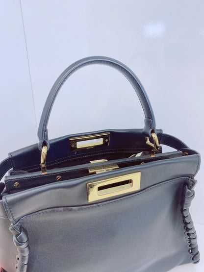 BLACK LEATHER MEDIUM WHIPSTITCHED PEEKABOO TOP HANDLE BAG
