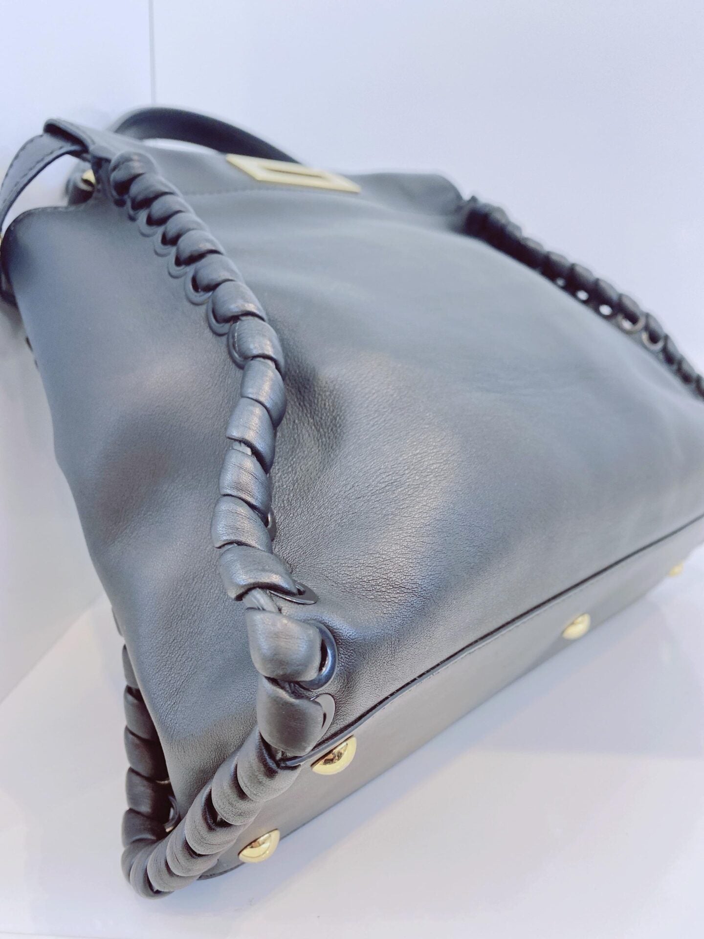 BLACK LEATHER MEDIUM WHIPSTITCHED PEEKABOO TOP HANDLE BAG