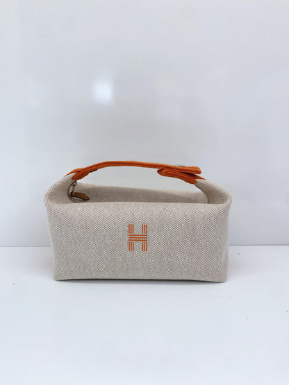 BEIGE ORANGE BRIDE-A-BRAC POUCH, SMALL MODEL