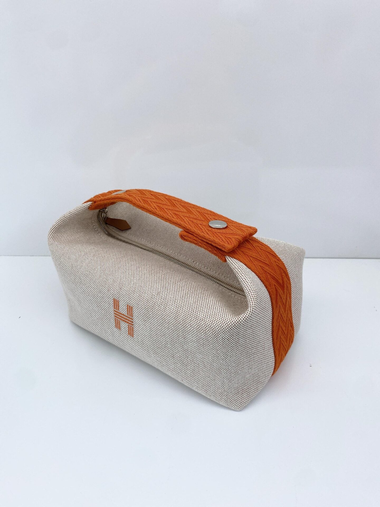 BEIGE ORANGE BRIDE-A-BRAC POUCH, SMALL MODEL