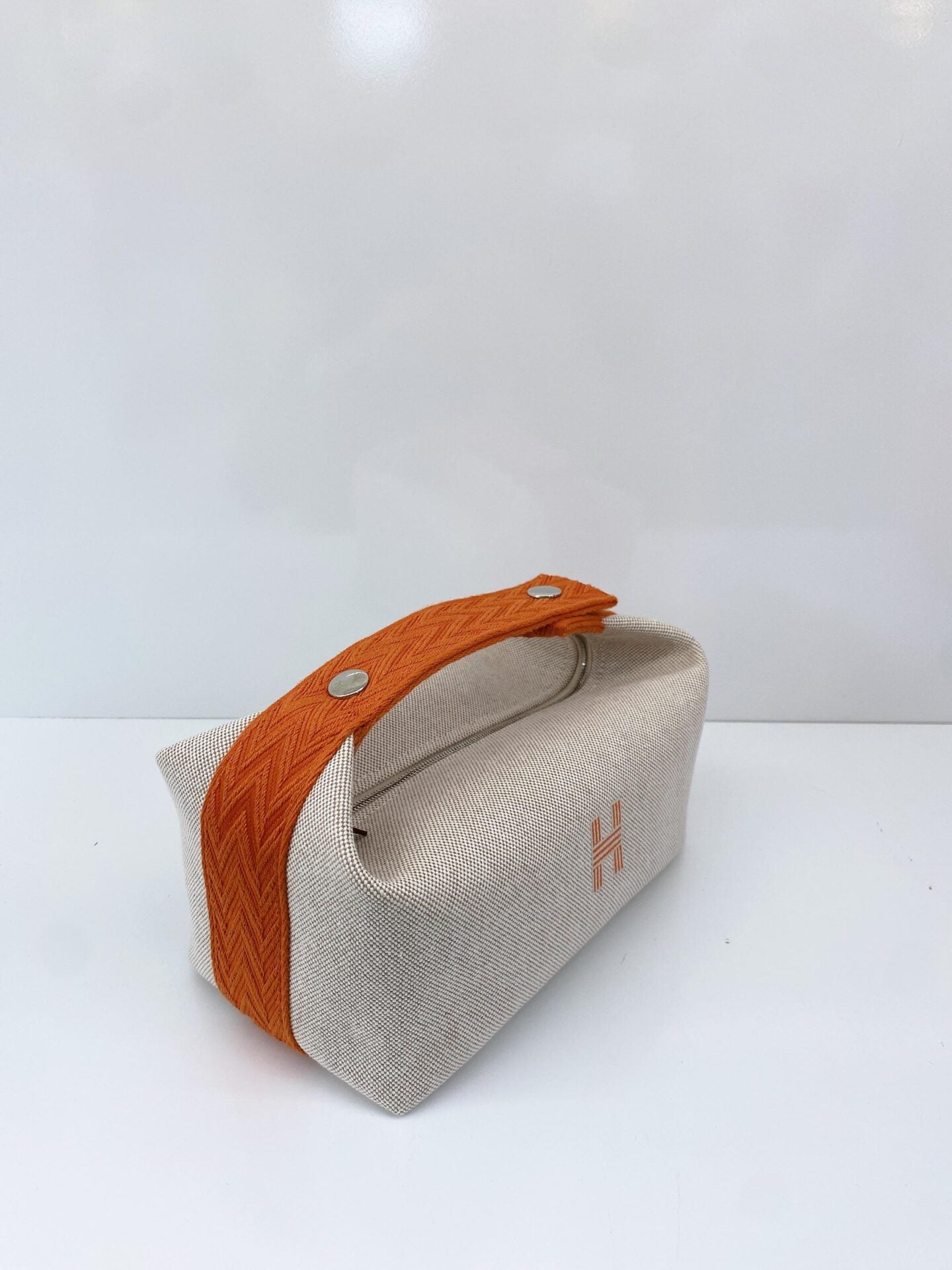 BEIGE ORANGE BRIDE-A-BRAC POUCH, SMALL MODEL
