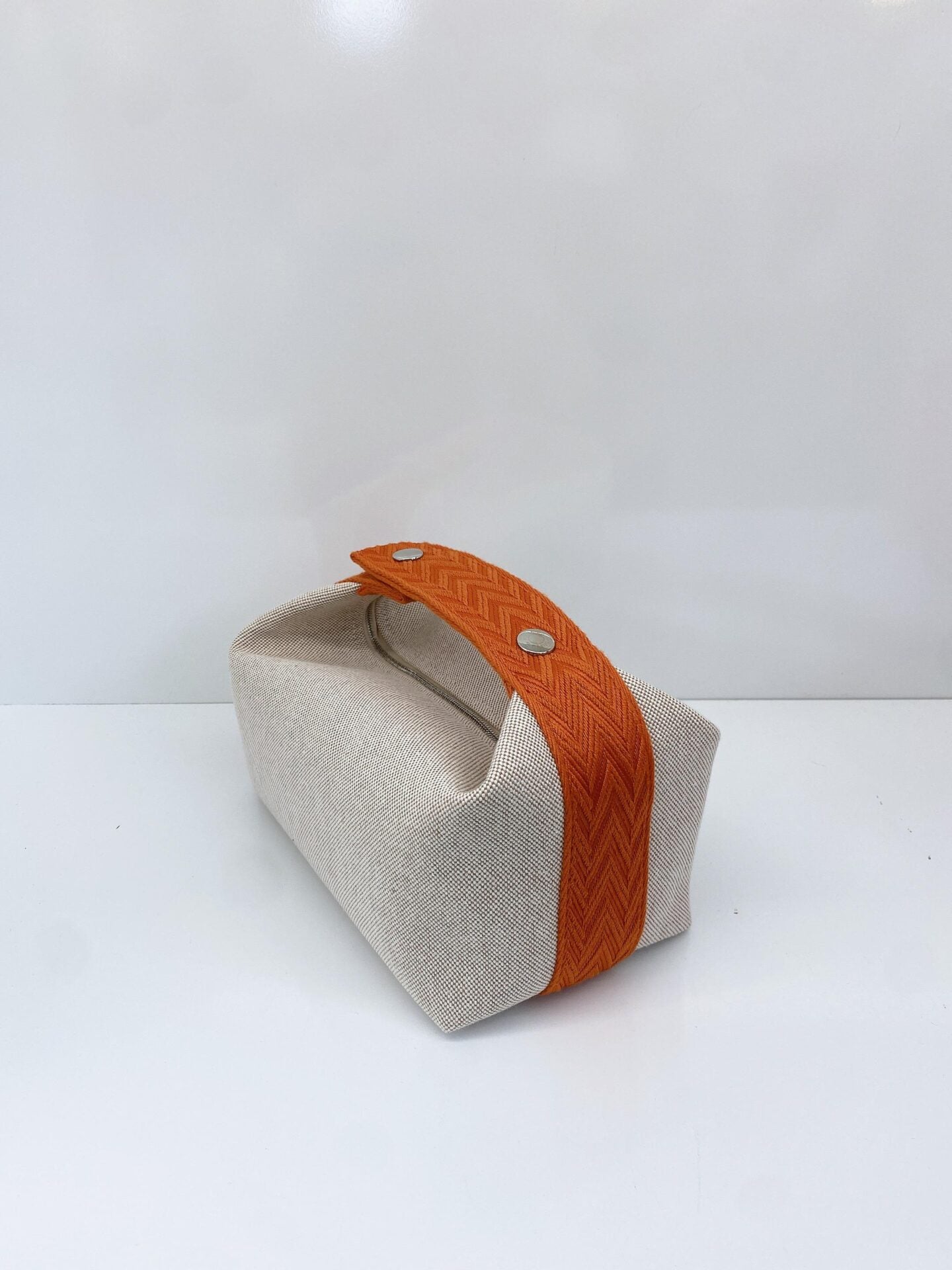 BEIGE ORANGE BRIDE-A-BRAC POUCH, SMALL MODEL