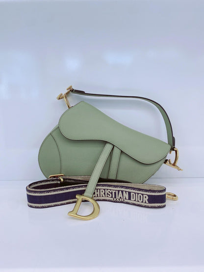 GRAINED LEATHER MEDIUM SADDLE BAG AND ADJUSTABLE EMBROIDERED SHOULDER STRAP