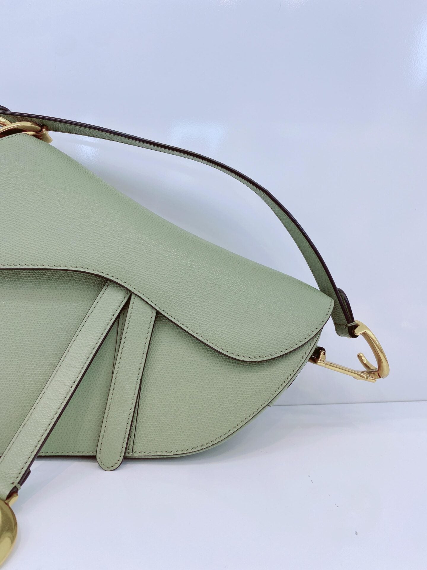 GRAINED LEATHER MEDIUM SADDLE BAG AND ADJUSTABLE EMBROIDERED SHOULDER STRAP