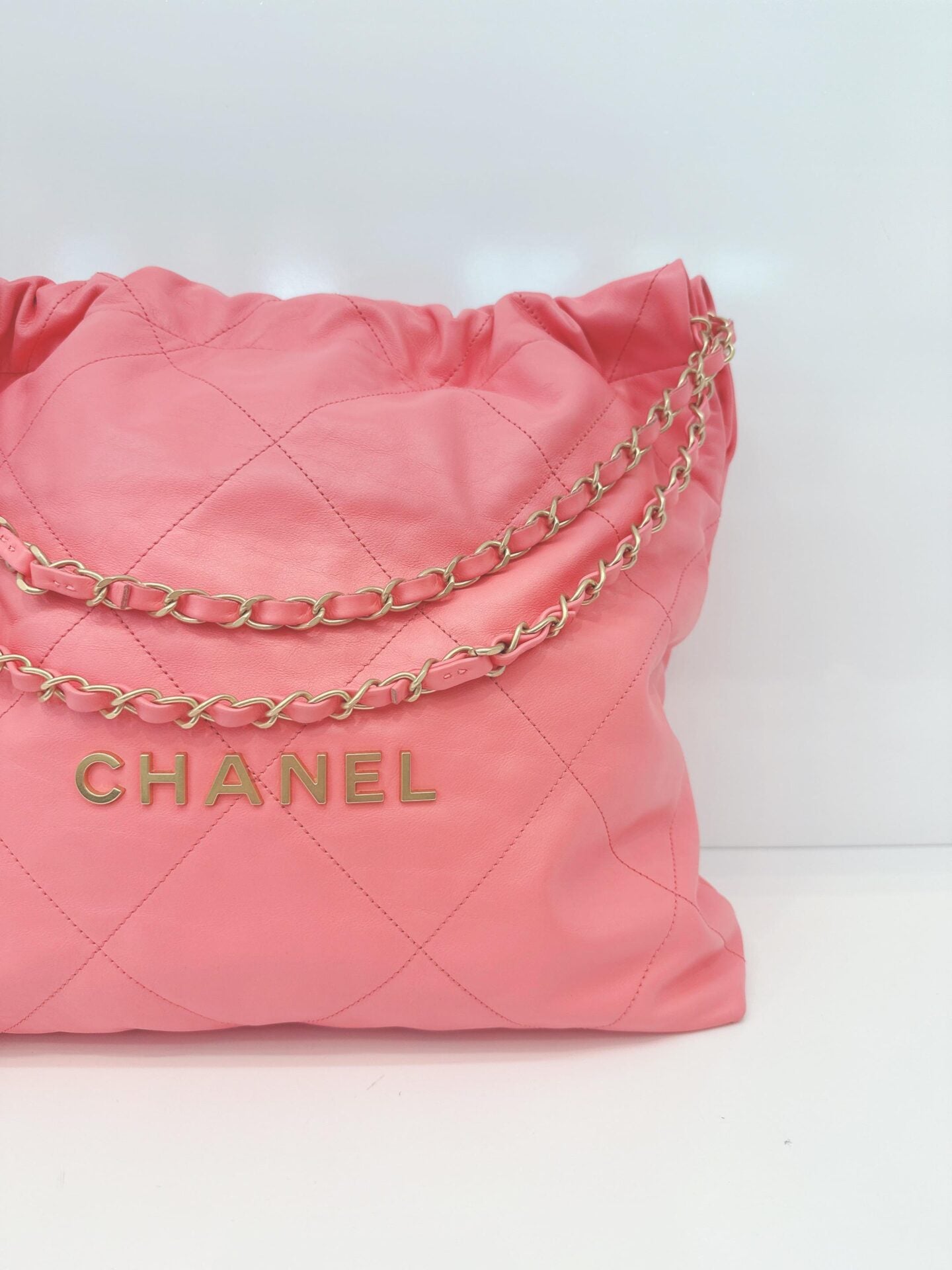 CORAL PINK CALFSKIN LEATHER CHANEL 22 HANDBAG