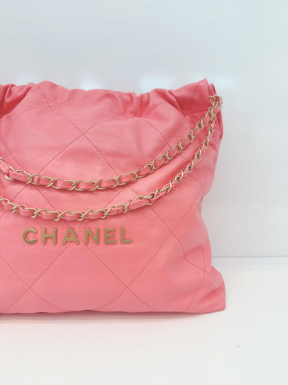 CORAL PINK CALFSKIN LEATHER CHANEL 22 HANDBAG