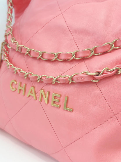 CORAL PINK CALFSKIN LEATHER CHANEL 22 HANDBAG