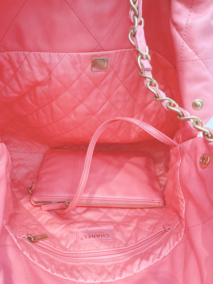 CORAL PINK CALFSKIN LEATHER CHANEL 22 HANDBAG