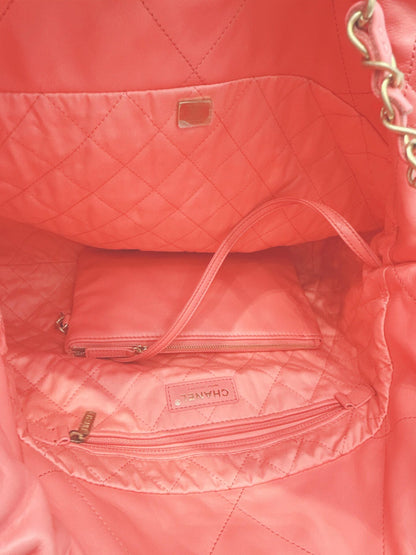 CORAL PINK CALFSKIN LEATHER CHANEL 22 HANDBAG