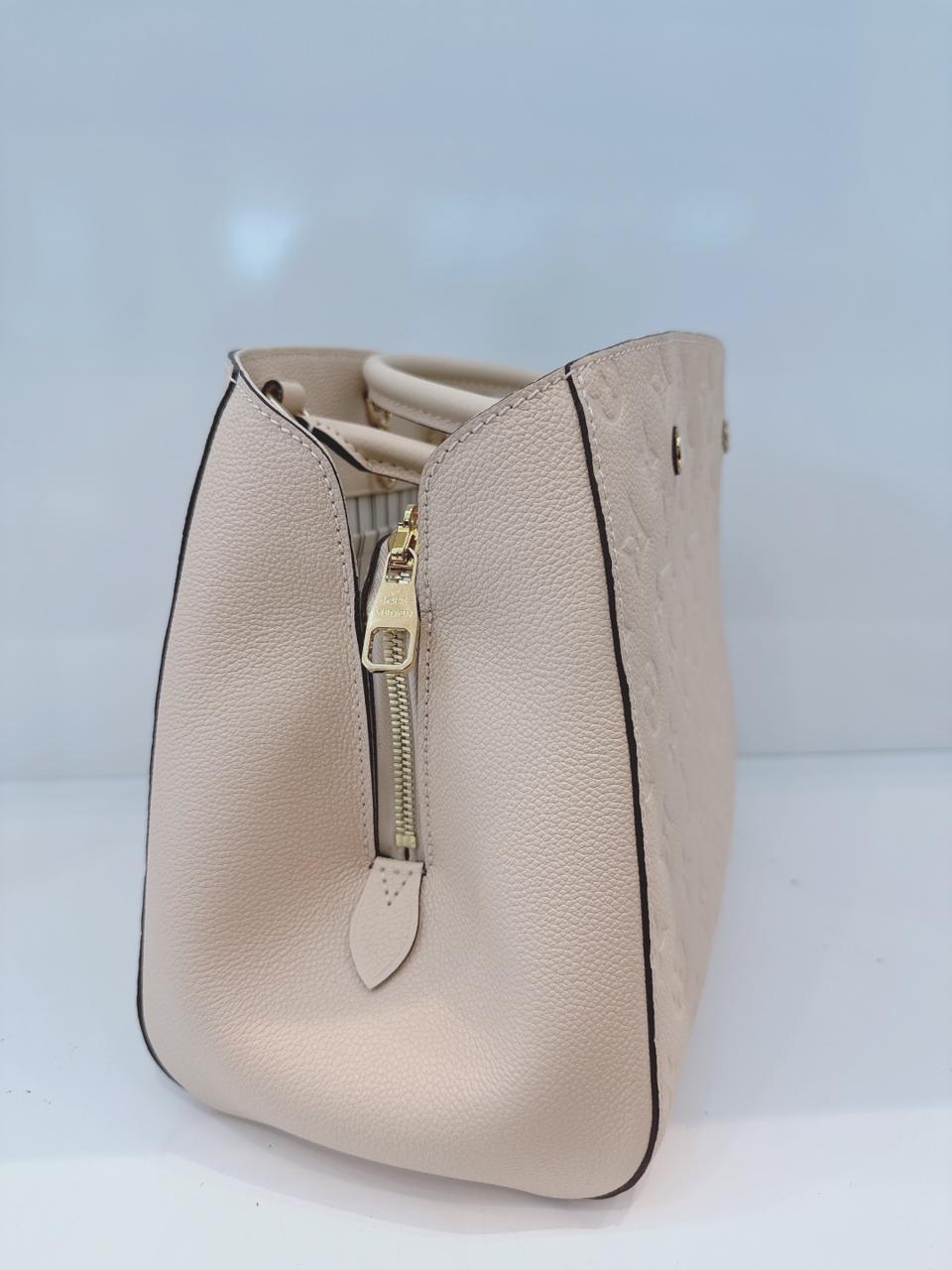 WHITE MONOGRAM EMPREINTE LEATHER MONTAIGNE MM BAG