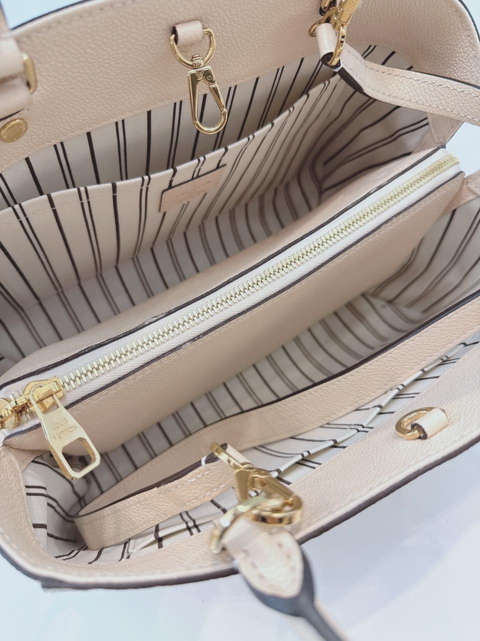 WHITE MONOGRAM EMPREINTE LEATHER MONTAIGNE MM BAG