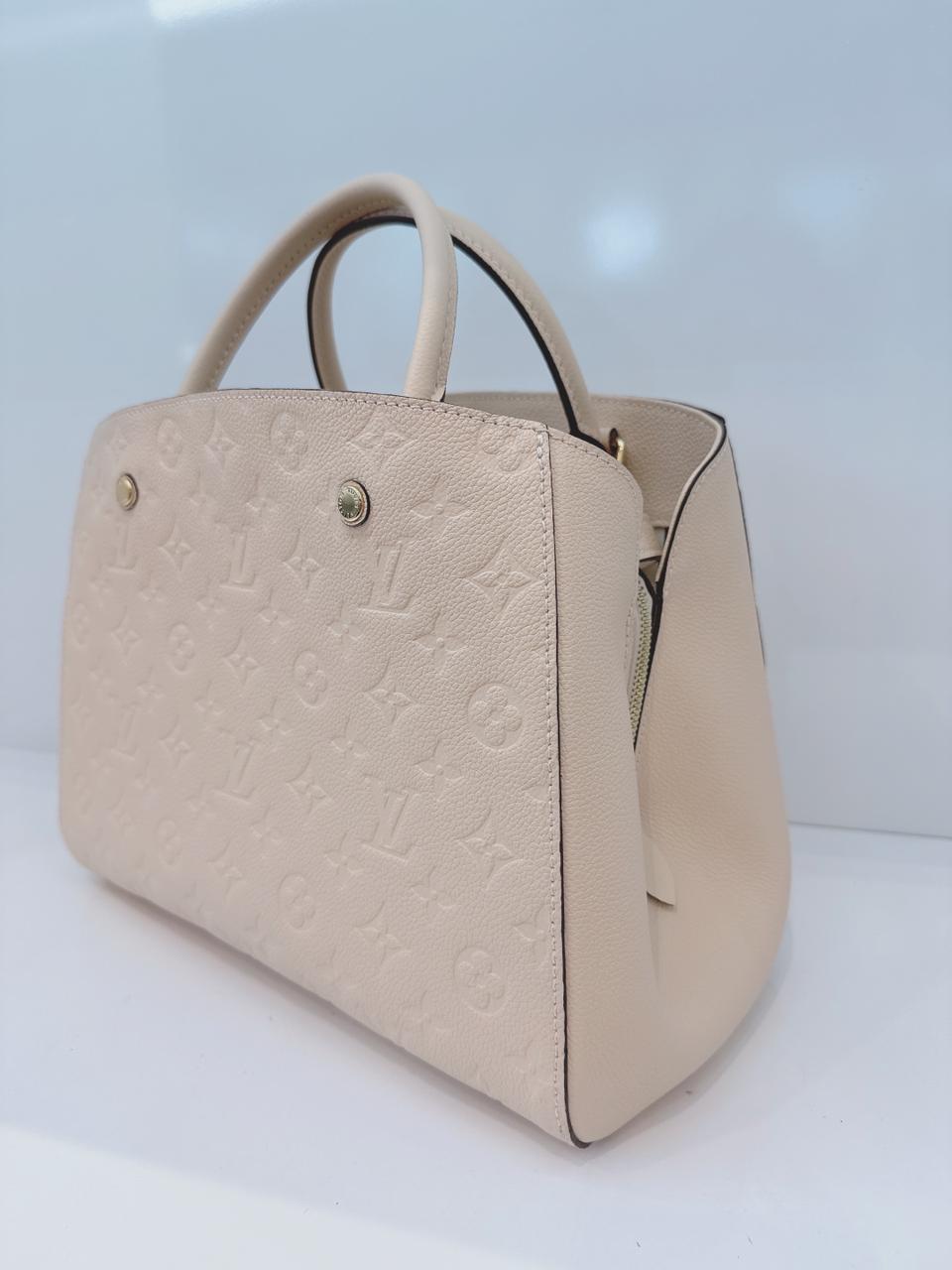 WHITE MONOGRAM EMPREINTE LEATHER MONTAIGNE MM BAG
