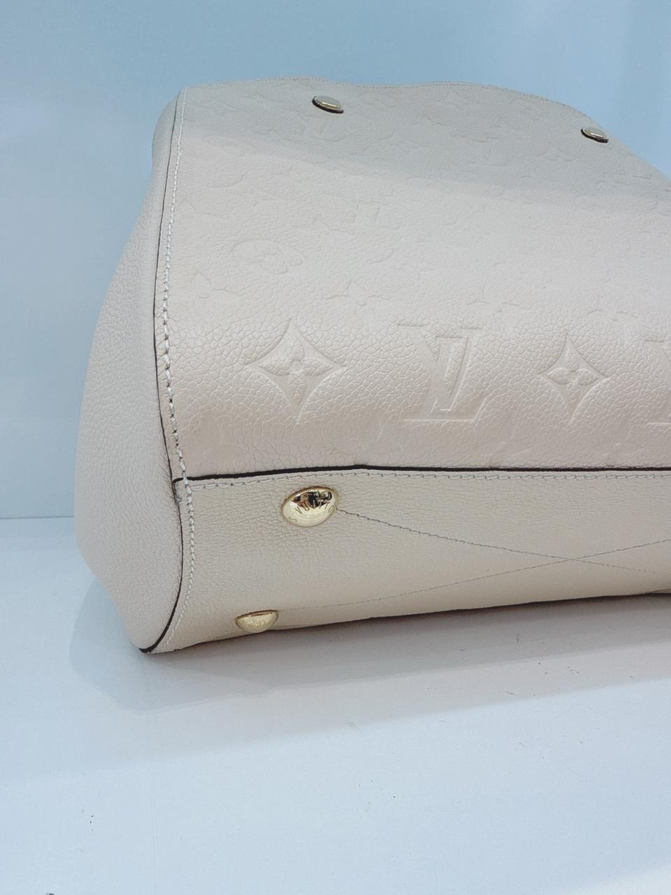 WHITE MONOGRAM EMPREINTE LEATHER MONTAIGNE MM BAG