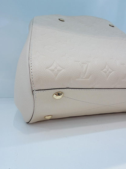 WHITE MONOGRAM EMPREINTE LEATHER MONTAIGNE MM BAG