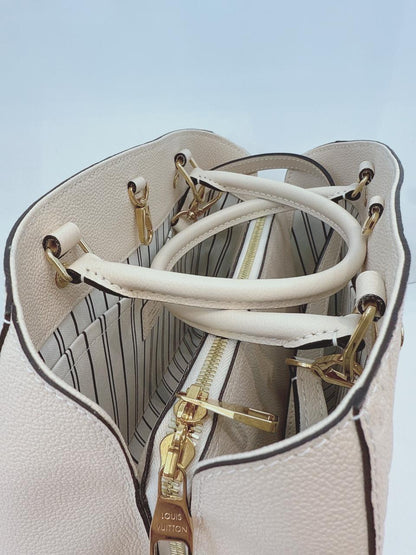 WHITE MONOGRAM EMPREINTE LEATHER MONTAIGNE MM BAG