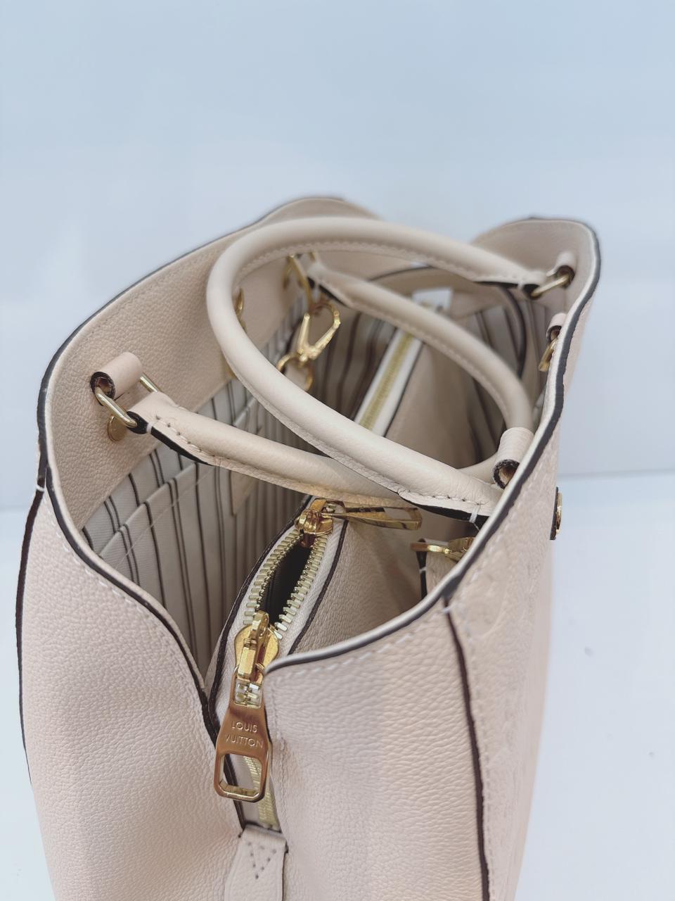 WHITE MONOGRAM EMPREINTE LEATHER MONTAIGNE MM BAG