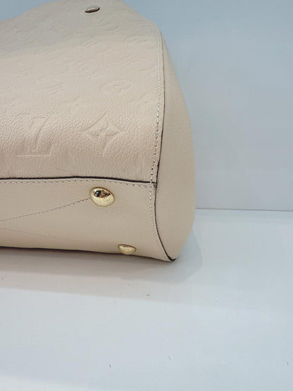 WHITE MONOGRAM EMPREINTE LEATHER MONTAIGNE MM BAG