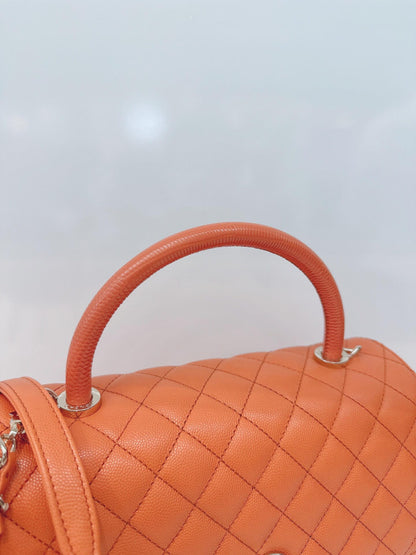 ORANGE QUILTED CAVIAR LEATHER MEDIUM COCO TOP HANDLE BAG